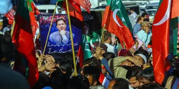 Protesters rallying for electoral transparency in the streets of Pakistan.