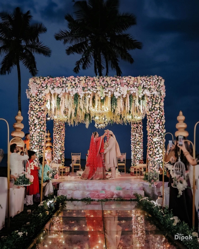 Couple participating in an Indian wedding ritual, embodying the essence of love over extravagance.