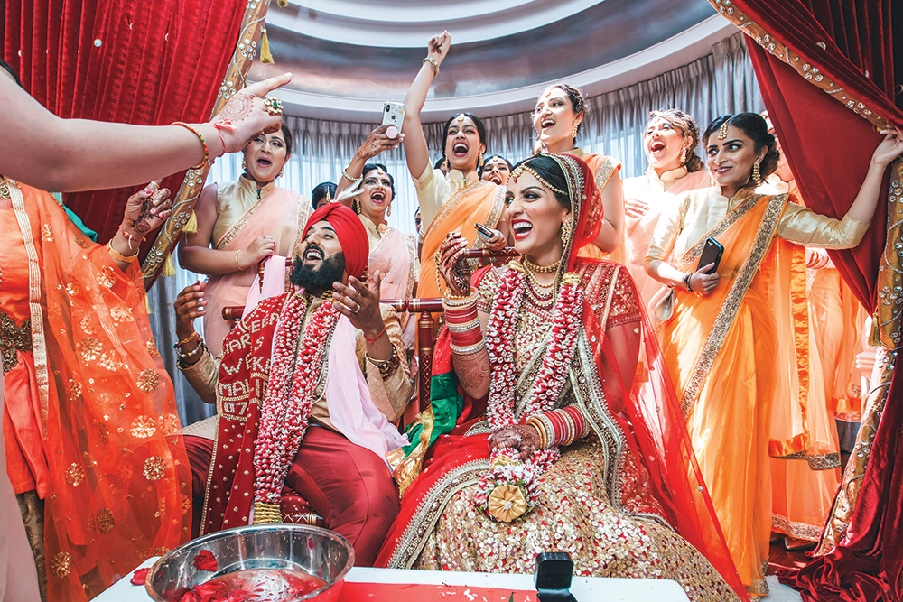 Family celebrating a traditional Indian wedding with a focus on sustainability and affordability.