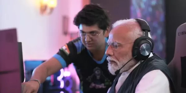 Prime Minister Narendra Modi shaking hands with top gamers, symbolizing government support for the gaming industry.